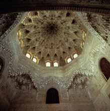 View of the mocarabes dome in the Abencerrajes room in the Alhambra of Granada.