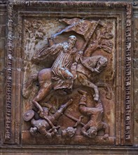 Yuso Monastery. High relief on the porch, with a scene of San Millán on horseback fighting the Ar?