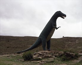 Reproduction of a dinosaur at the footprints site of such animals.