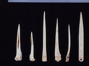 Bone awls and needles from the Cova de l'Or (Beniarrés, Alicante). Made by abrasion technique. Le?