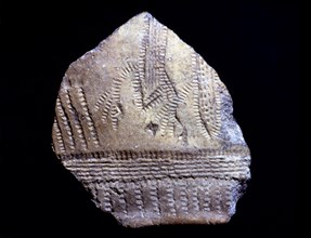 Cardium pottery fragment with anthropomorphic figures, they seem two persons with arms raised as ?