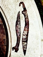 Iberian falcatas, one of them with a horse head handle, from the Necropolis of Cabecico del Tesor?