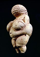 Venus of Willendorf', 110 mm.: woman statue made in limestone and painted with ochre. It is rhomb?
