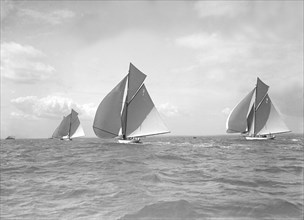 The 12 Metre class 'Alachie', 'Cintra' and 'Ierne' racing at Cowes, 1911. Creator: Kirk & Sons of Cowes.
