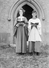 Woman and boy chorister, (Isle of Wight?), c1935. Creator: Kirk & Sons of Cowes.