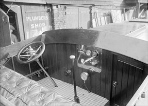 The Interior of a Wolseley launch showing controls and instrument panel. Creator: Kirk & Sons of Cowes.