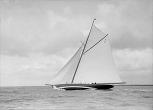 The cutter 'Shamrock' beating upwind, 1912. Creator: Kirk & Sons of Cowes.