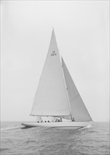 The 12 Metre 'Vim' sailing close-hauled, 1939. Creator: Kirk & Sons of Cowes.