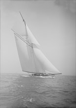 The 19-metre 'Octavia' sailing close-hauled, 1911. Creator: Kirk & Sons of Cowes.