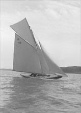 The 8 Metre sailing yacht 'Antwerpia' (H19), 1911. Creator: Kirk & Sons of Cowes.