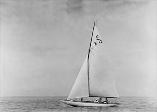 The 6 Metre sailing yacht 'Caryl' (K12), 1921. Creator: Kirk & Sons of Cowes.