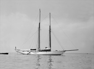 The schooner 'Joyance' at anchor, 1913. Creator: Kirk & Sons of Cowes.