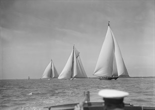 Magnificent group of 1st Class Races: 'Shamrock V', 'White Heather' and 'Candida', 1930.  Creator: Kirk & Sons of Cowes.