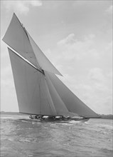 The 19-metre class 'Mariquita' sailing close-hauled, 1911. Creator: Kirk & Sons of Cowes.