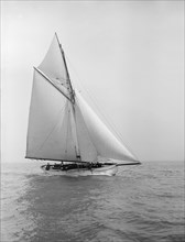 The cutter 'Grisette' sailing close-hauled, 1913. Creator: Kirk & Sons of Cowes.