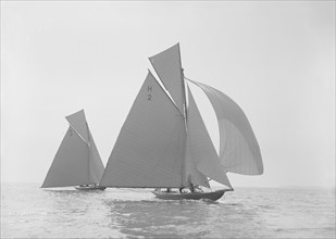 The two early 8 Metre class 'Verbena' and 'Termagent' racing in a gentle wind, 1911. Creator: Kirk & Sons of Cowes.