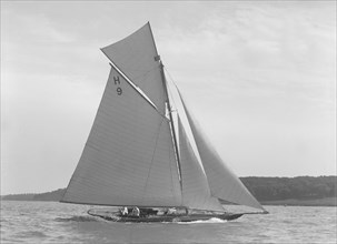 The gaff rigged 8 Metre class 'Termagent' (H9) sailing close-hauled, 1911. Creator: Kirk & Sons of Cowes.