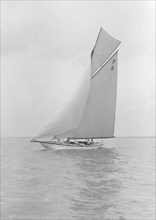 The 10 Metre class 'Eleda' (F6) sailing close-hauled, 1913. Creator: Kirk & Sons of Cowes.