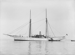 The steam yacht 'Priscilla' at anchor, 1911. Creator: Kirk & Sons of Cowes.