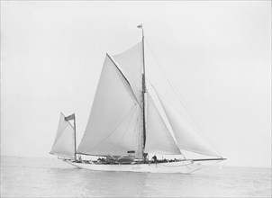 A yawl under way, 1913. Creator: Kirk & Sons of Cowes.