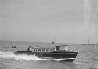 The motor boat 'Island Enterprise', S.I.W. Steam Packet Co., 1933. Creator: Kirk & Sons of Cowes.