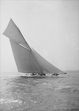 The beautiful 52 ft cutter 'Sonya' sailing close-hauled, 1913. Creator: Kirk & Sons of Cowes.