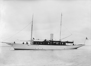 The steam yacht 'Madeline' at anchor. Creator: Kirk & Sons of Cowes.