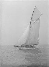 The 15 Metre cutter 'Ma'oona' sailing close-hauled, 1914. Creator: Kirk & Sons of Cowes.