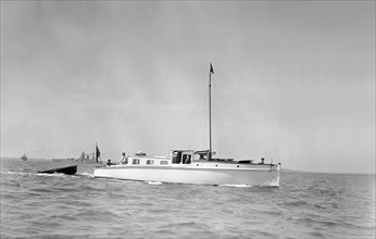 The motor yacht 'Sygnet' under way, 1933. Creator: Kirk & Sons of Cowes.