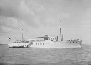 The motor yacht 'Wilma' at anchor, 1936. Creator: Kirk & Sons of Cowes.