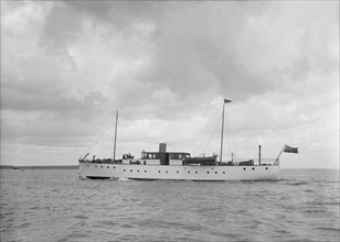 The 85 ton motor yacht 'Aldic' under way, 1936. Creator: Kirk & Sons of Cowes.