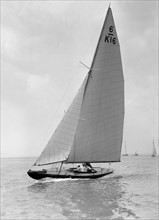 The 6 Metre 'Jean' (K16) sailing upwind, 1922. Creator: Kirk & Sons of Cowes.