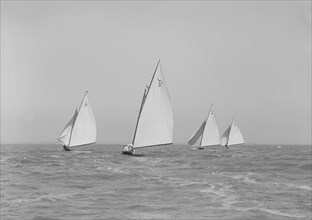 The 6 Metres boats 'Snowdrop', 'The Whim', 'Cheetal' and 'Ejnar' racing downwind. Creator: Kirk & Sons of Cowes.