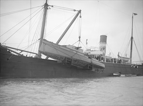 'Sabin' being shipped, 1912. Creator: Kirk & Sons of Cowes.