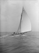 The 7 Metre 'Ginerva' (K7) under sail, 1912. Creator: Kirk & Sons of Cowes.