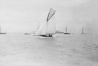 The gaff cutter 'Wigeon' under sail, 1910. Creator: Kirk & Sons of Cowes.