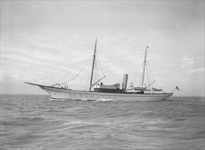 The steam yacht 'Christine' under way, 1911. Creator: Kirk & Sons of Cowes.