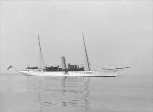 The steam yacht 'Sabrina' at anchor, 1914. Creator: Kirk & Sons of Cowes.