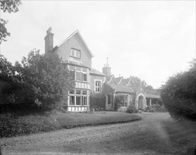 House and garden, c1935. Creator: Kirk & Sons of Cowes.