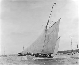 The yawl 'Valentine' under sail, 1909. Creator: Kirk & Sons of Cowes.
