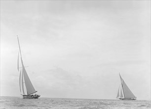 The 179 ton 'White Heather' and 221 ton 'Britannia' racing upwind, 1921. Creator: Kirk & Sons of Cowes.