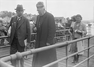 Catholic priest, c1935. Creator: Kirk & Sons of Cowes.