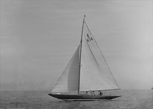 The 6 Metre sailing yacht 'Margaret' (K14) sailing close-hauled, 1921. Creator: Kirk & Sons of Cowes.