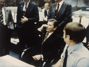President Ronald Reagan speaks to astronauts on the Space Shuttle, 1981. Creator: NASA.