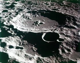 Close-up view of a crater on the surface of the Moon. Creator: NASA.