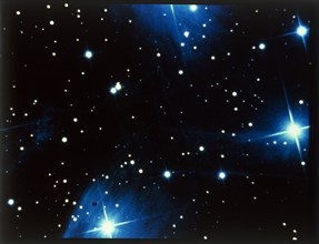 Open star cluster, the Pleiades in Taurus. Creator: NASA.