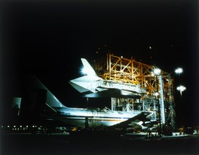 Space Shuttle and 747 carrier plane in Mate-Demate Device. Creator: NASA.