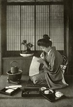 Writing A Letter', 1910.