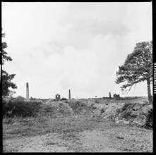 Industrial landscape with abandoned mine engine houses and chimneys, Tamar Valley, Cornwall, 1967