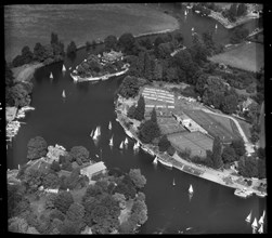 Sailing boats on the River Thames and Weybridge Tennis Club, Weybridge, Surrey, 1959.  Creator